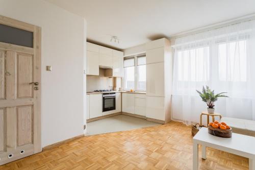 Η κουζίνα ή μικρή κουζίνα στο Apartament 26 z widokiem na jezioro - Olsztyn, Kortowo
