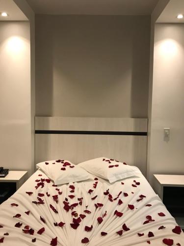 Katil atau katil-katil dalam bilik di Scarpelli Palace Hotel