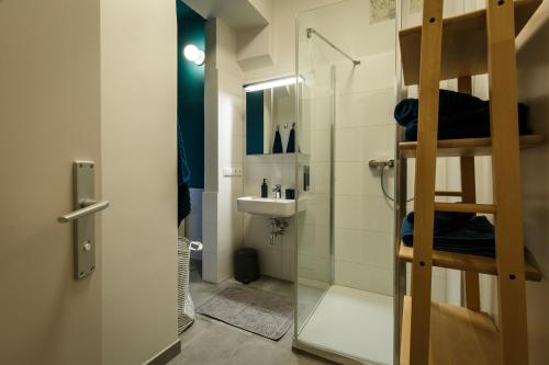 Vonios kambarys apgyvendinimo įstaigoje Blue flat by GrazRentals best location & free parking