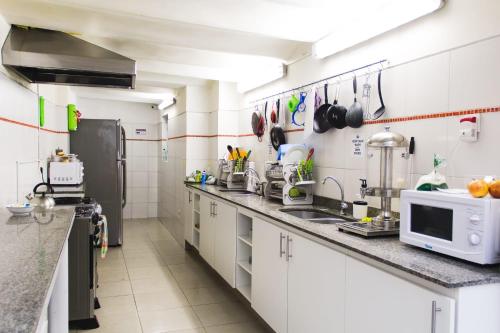 A kitchen or kitchenette at Student’s Hostel