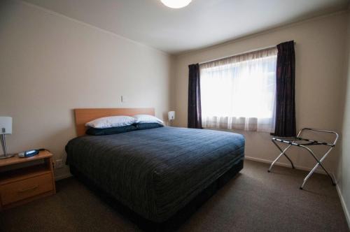 Postel nebo postele na pokoji v ubytování Jafa's Motels