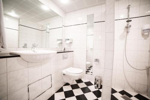 Kupatilo u objektu Comwell Hvide Hus Aalborg