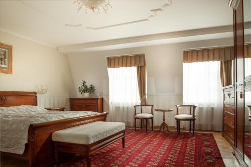 Ένα ή περισσότερα κρεβάτια σε δωμάτιο στο Spa Hotel Schlosspark