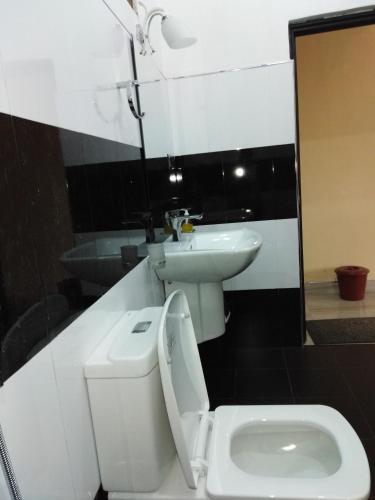 Un baño de Jade Green Rest Inn