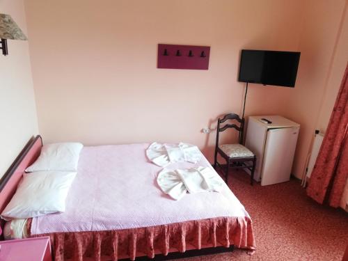 Katil atau katil-katil dalam bilik di Teras Motel