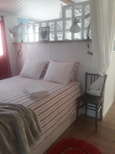 Ein Bett oder Betten in einem Zimmer der Unterkunft El Atico de Villalmar