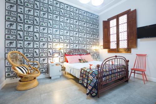 Postel nebo postele na pokoji v ubytování Jacaranda