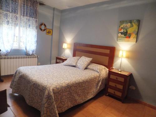 Кровать или кровати в номере Puerta del Arco