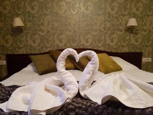 Postel nebo postele na pokoji v ubytování Hotel Esprit