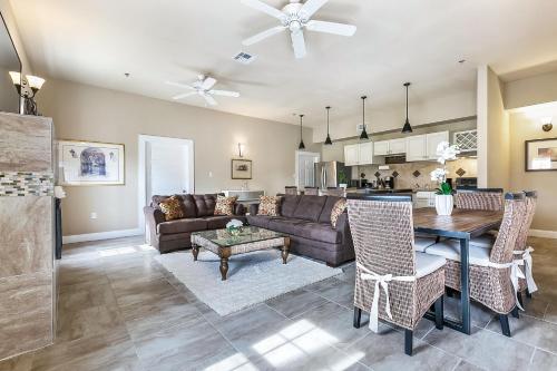 a living room with a couch and a table at Modern 5BR Condo in NOLA in New Orleans