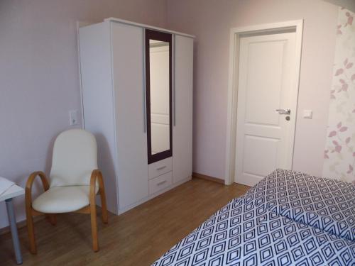 Postel nebo postele na pokoji v ubytování Ferienwohnung und -Zimmer Becks