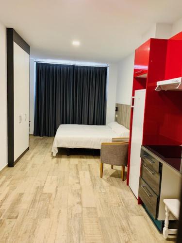 Ένα ή περισσότερα κρεβάτια σε δωμάτιο στο Hotel Madrid Río