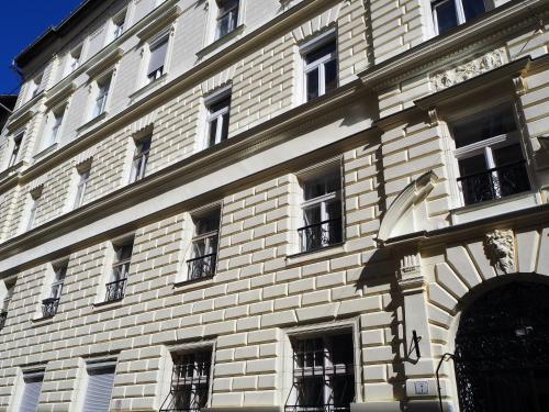 a large brick building with windows on the side of it at SummerStreetSeven in Budapest