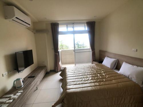 TV a/nebo společenská místnost v ubytování Best Warm B&B