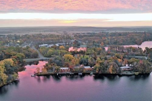 an island in the middle of a body of water at Curriers Lakeview Lodge in Rice Lake