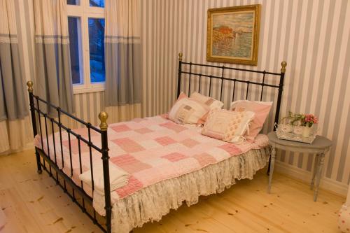 מיטה או מיטות בחדר ב-Villa Tammsaare