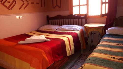 Riad Atlas Berbèreにあるベッド