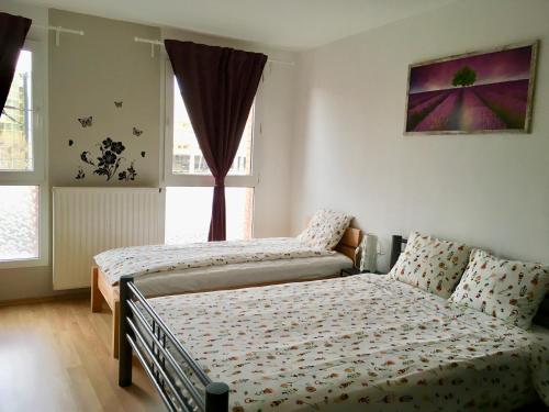 Lova arba lovos apgyvendinimo įstaigoje Budapest Baross Apartment