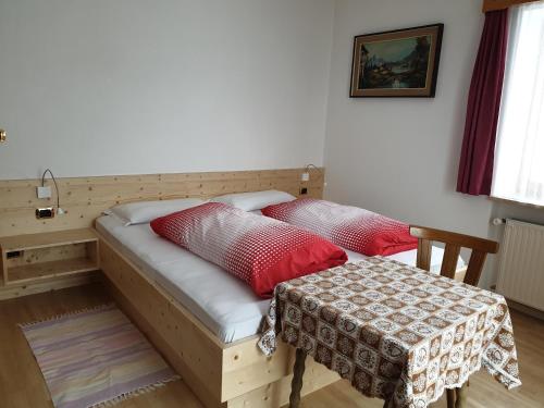 Ein Bett oder Betten in einem Zimmer der Unterkunft Residence Alpenblick