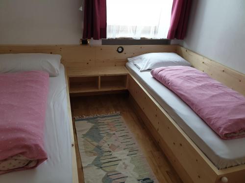 Ein Bett oder Betten in einem Zimmer der Unterkunft Residence Alpenblick