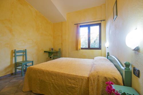 Ένα ή περισσότερα κρεβάτια σε δωμάτιο στο Appartamento Magnolia