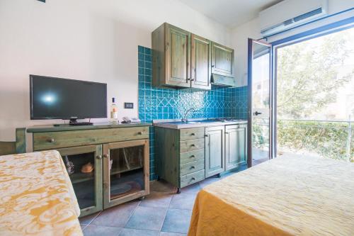 Imagen de la galería de Appartamento Magnolia, en Cala Liberotto