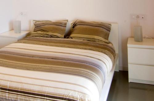 Postel nebo postele na pokoji v ubytování Casa Cal Fuster