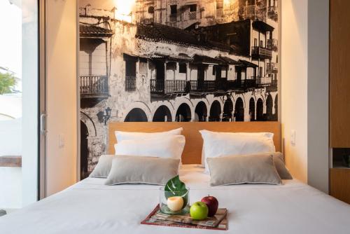 Delirio Hotel tesisinde bir odada yatak veya yataklar