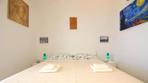 Posteľ alebo postele v izbe v ubytovaní Casa Panoramica Santa Lucia