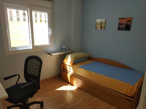 Postel nebo postele na pokoji v ubytování benalmadena nuevatorrequebrada