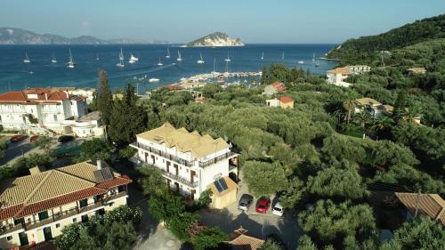 an aerial view of a town with boats in the water at Dakis Studios in Keri