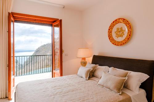 Postel nebo postele na pokoji v ubytování Villa Sant'Alfonso