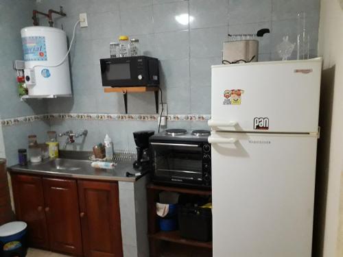 Kuchyň nebo kuchyňský kout v ubytování Departamento 48