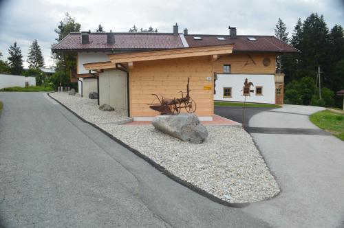 a building with a bike parked in front of it at CHALET BELLE WILD by Belle Stay in Going