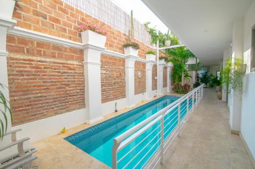 Πισίνα στο ή κοντά στο El Cactus Luxury Apartments in Historic Center