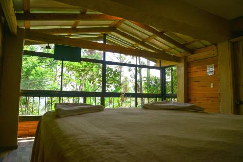 Cama o camas de una habitación en Rancho Tierra Alta