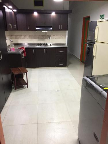 Kuchyň nebo kuchyňský kout v ubytování casa hostal las palmeras