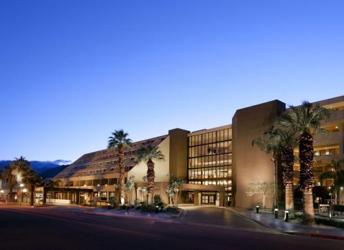 a large building with a lot of windows at Hyatt Palm Springs in Palm Springs