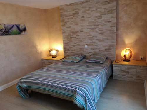 Katil atau katil-katil dalam bilik di Le Mas des Geais