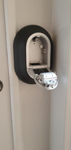 a door handle with a mirror on a door at Hotel apartment with a lake view - 2 room apartment in Kruså