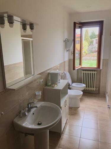 Kúpeľňa v ubytovaní La Casa sul Trasimeno
