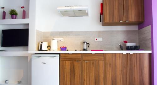 Dapur atau dapur kecil di Rainbow Apartments