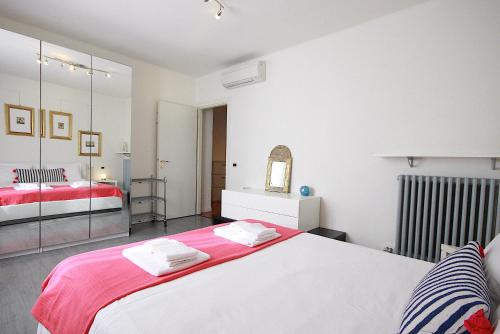 Posteľ alebo postele v izbe v ubytovaní Bianco Apartment