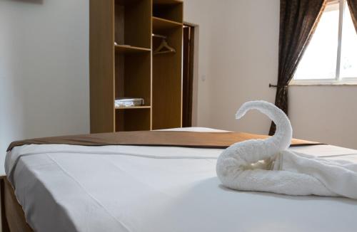 Ένα ή περισσότερα κρεβάτια σε δωμάτιο στο Paradise Agua Leve Residential
