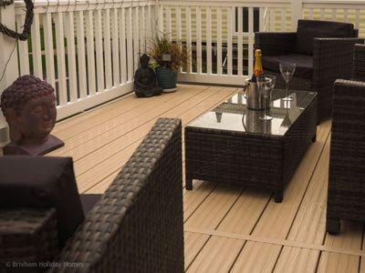 a living room with a couch and a table at Springfield B6 in Brixham