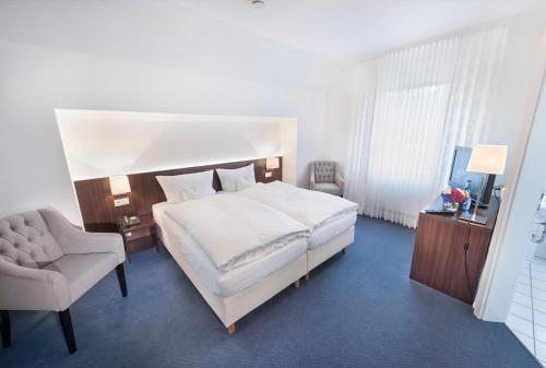 Giường trong phòng chung tại Landgasthaus Kathmann- bed and breakfast