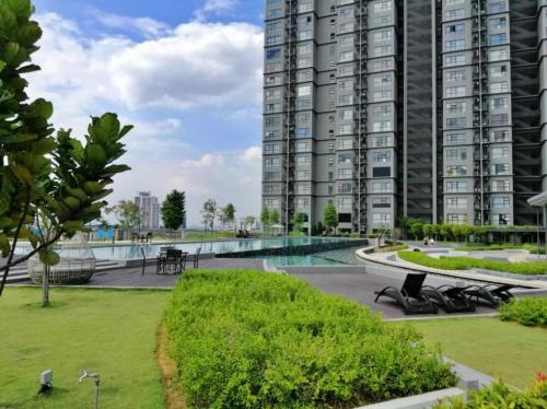 a large apartment complex with a large building at The ComfyHauz # Cyberjaya in Cyberjaya