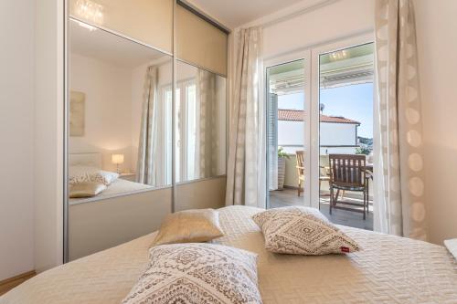 Postel nebo postele na pokoji v ubytování Luxury apartment Dalia
