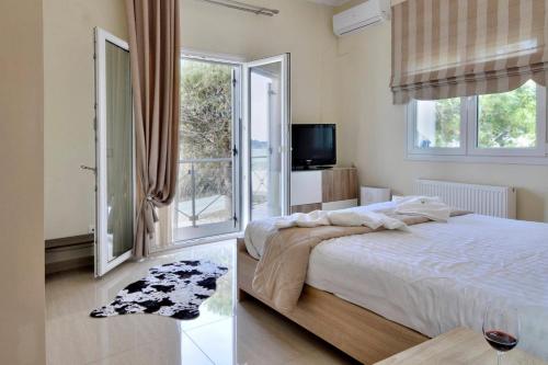 Katil atau katil-katil dalam bilik di Katoi Apartment 2 Agios Georgios Pagoi