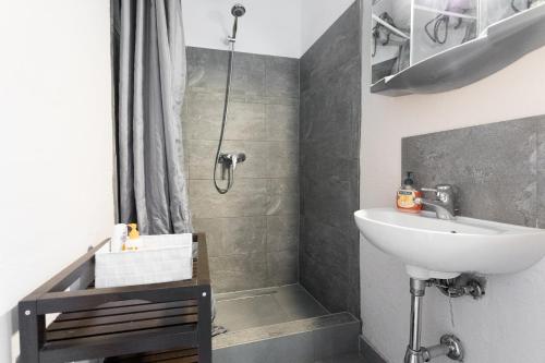 A bathroom at Cute Red Star Studio City Center